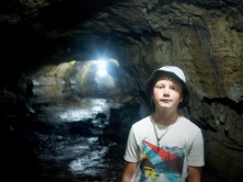 Caleb at one of Santa Cruz’s long (>1km) lava tunnels, formed when the outside of a lava flow cools but the middle keeps moving